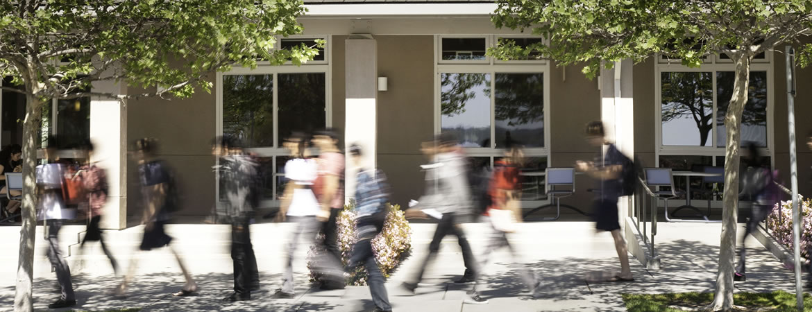 UC Merced students walking down Scholar's Lane